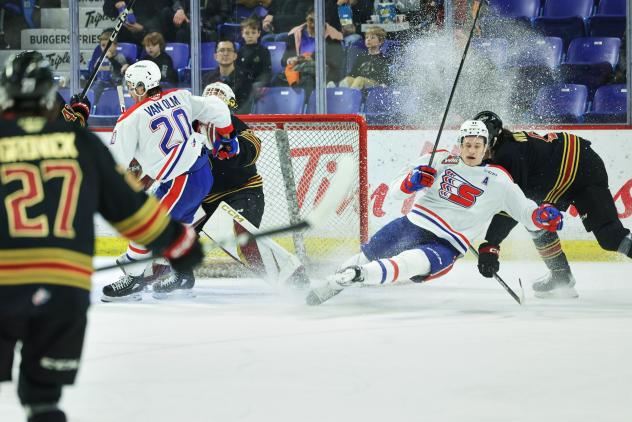 Vancouver Giants defend against the Spokane Chiefs