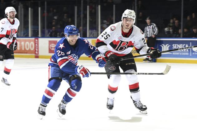 Rochester Americans' Mason Jobst and Belleville Senators' Tyler Kleven in action