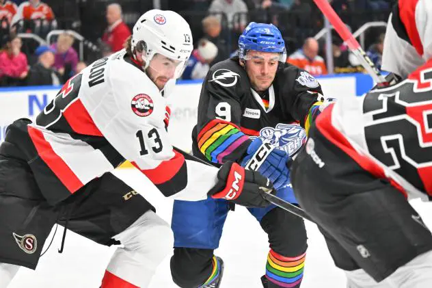 Belleville Senators' Egor Sokolov versus Syracuse Crunch's Gabriel Fortier