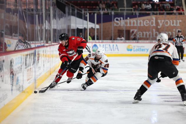 Lehigh Valley Phantoms right wing Cooper Marody (right) vs. the Charlotte Checkers