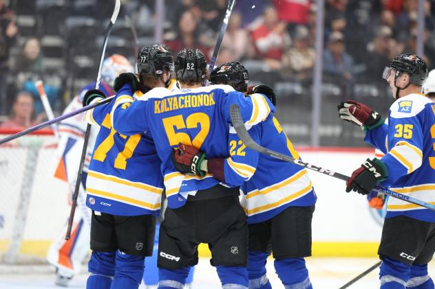 Tucson Roadrunners celebrate a goal