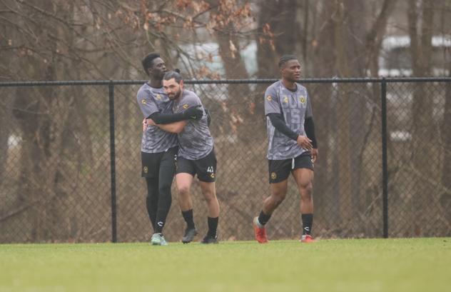 Jackson Walti and Babacar Diene of the Pittsburgh Riverhounds celebrate a goal