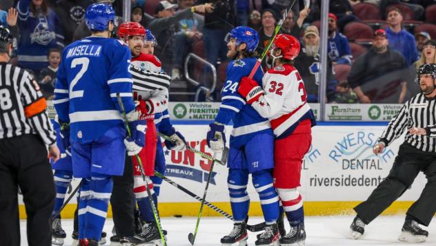 Wichita Thunder exchange pleasantries with the Allen Americans