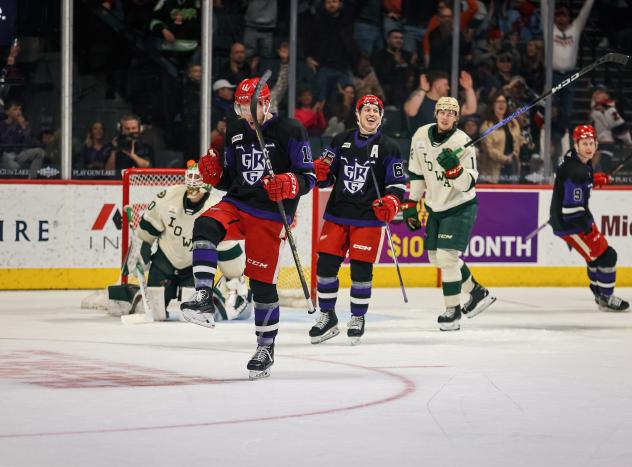 Grand Rapids Griffins' Joel L'Esperance and Dominik Shine celebrate win