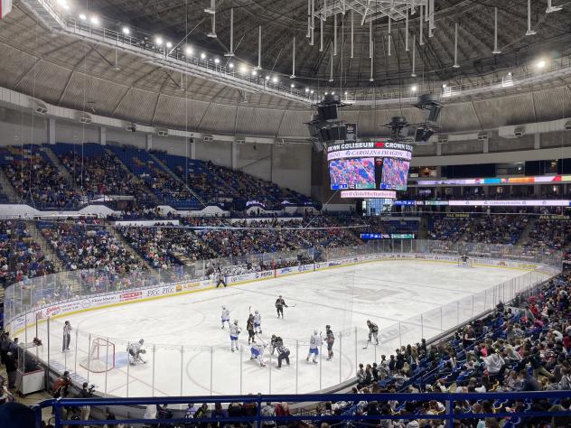 A school day crowd watches the Fayetteville Marksmen