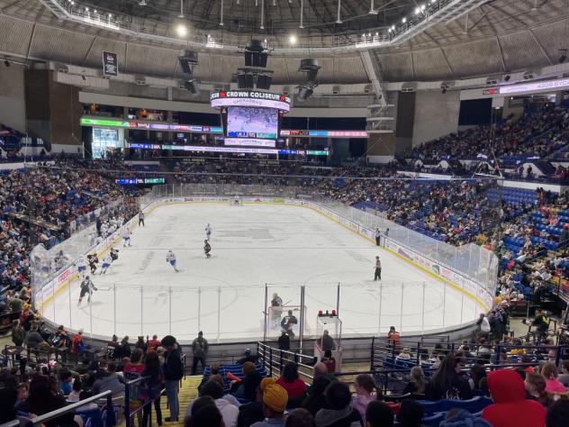 A school day crowd watches the Fayetteville Marksmen