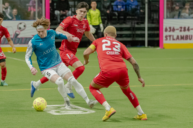 St. Louis Ambush forward John Eskay (left) vs. the Kansas City Comets