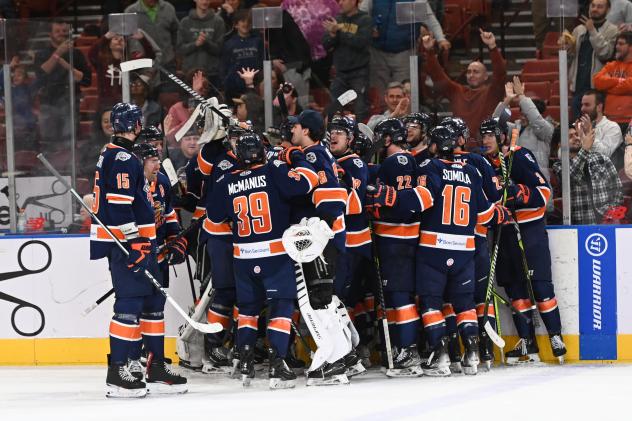 Greenville Swamp Rabbits gather after a win