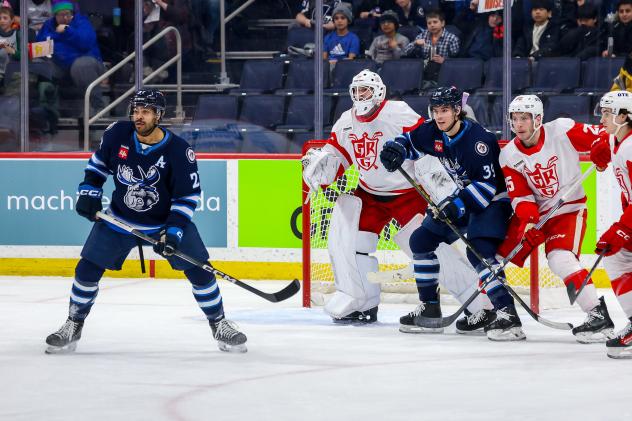 Grand Rapids Griffins defend against the Manitoba Moose