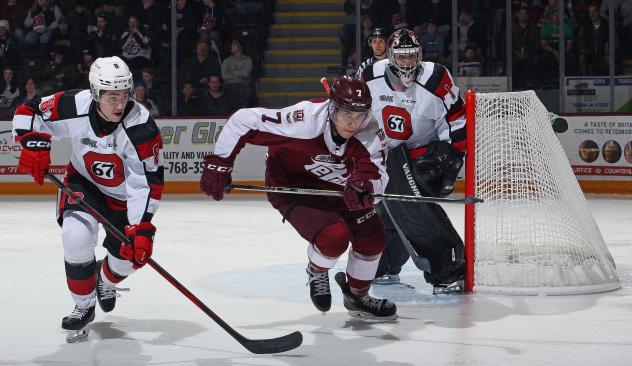 Peterborough Petes centre Chase Lefebvre (middle) vs. the Ottawa 67's