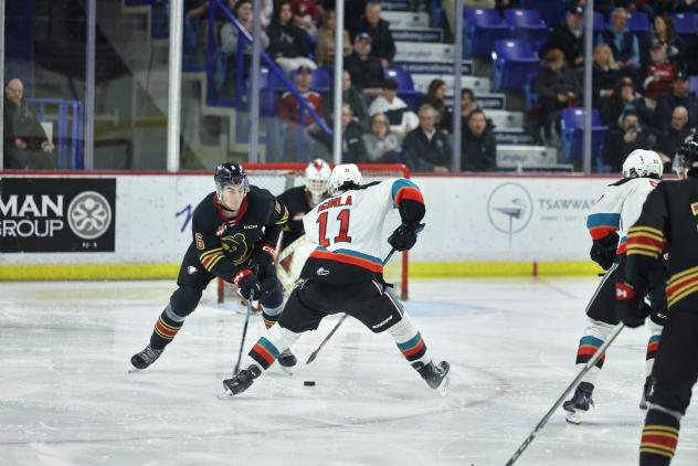 Vancouver Giants' Colton Roberts battles Kelowna Rockets' Tij Iginla