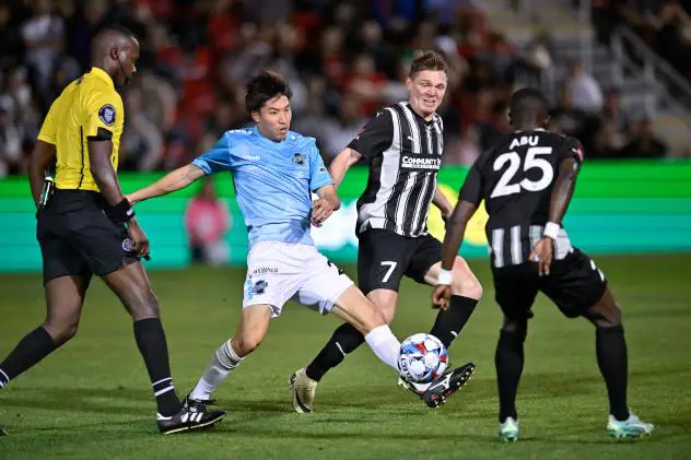 Colorado Springs Switchbacks FC's battles San Antonio FC's Luke Haakenson and Mohammed Abu