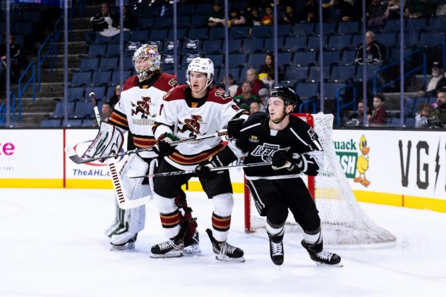 Tucson Roadrunners defend against the Ontario Reign