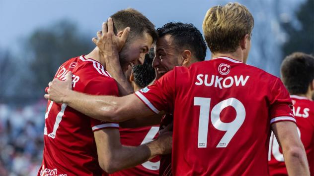 Richmond Kickers' Chandler O'Dwyer and Justin Sukow celebrate win