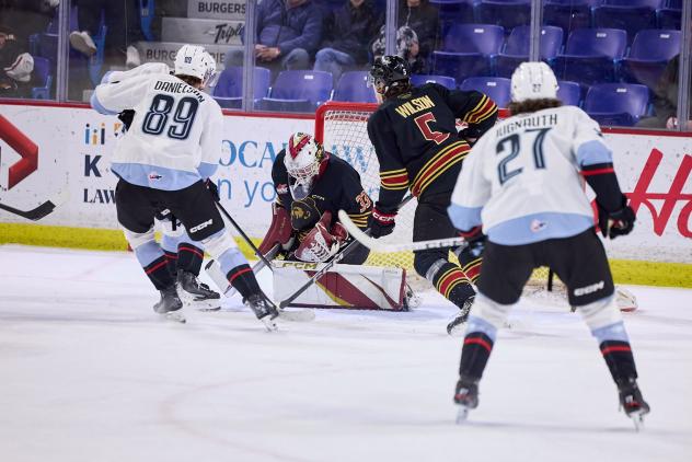 Vancouver Giants goaltender Brett Mirwald makes a stop