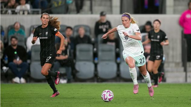 Racing Louisville FC forward Kirsten Wright (right)