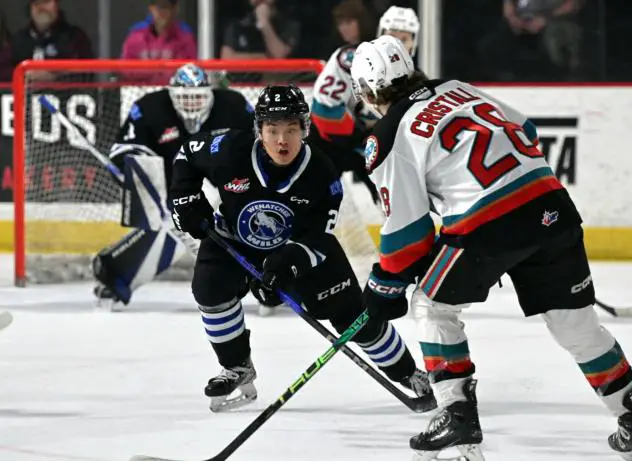 Wenatchee Wild's Landon Young versus Kelowna Rocket's Andrew Cristall