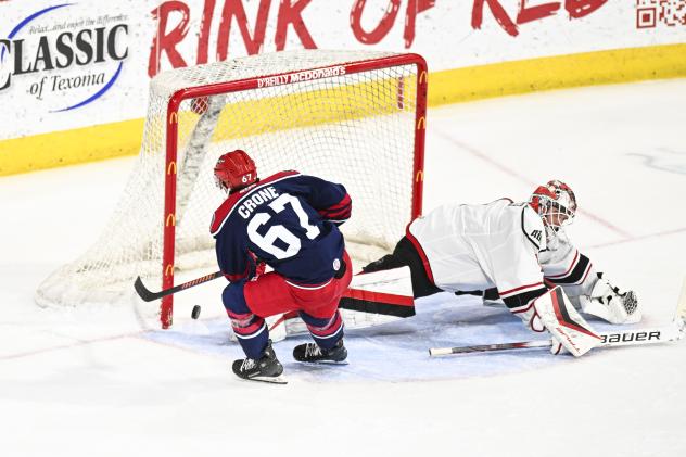 Hank Crone scores for the Allen Americans