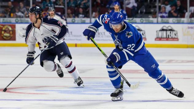 Wichita Thunder forward Michal Stinil (right) vs. the Tulsa Oilers