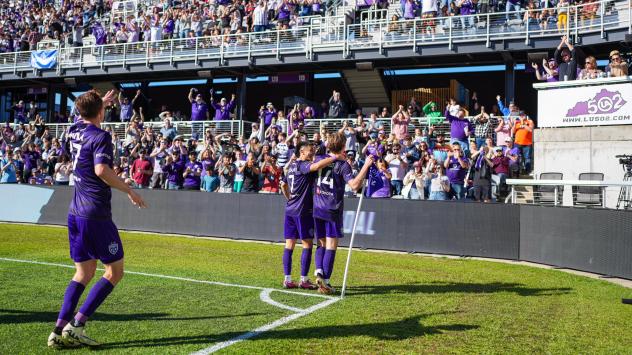 Louisville City FC celebrates a goal