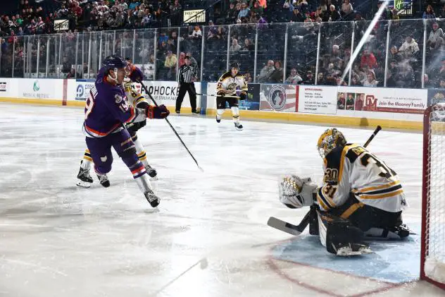 Youngstown Phantoms' Michael Burchill versus Green Bay Gamblers' Adam Gajan