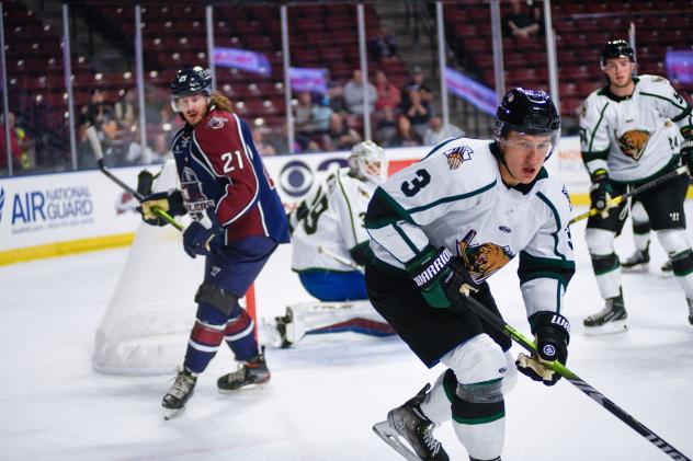 Utah Grizzlies defenseman Gianni Fairbrother (front)