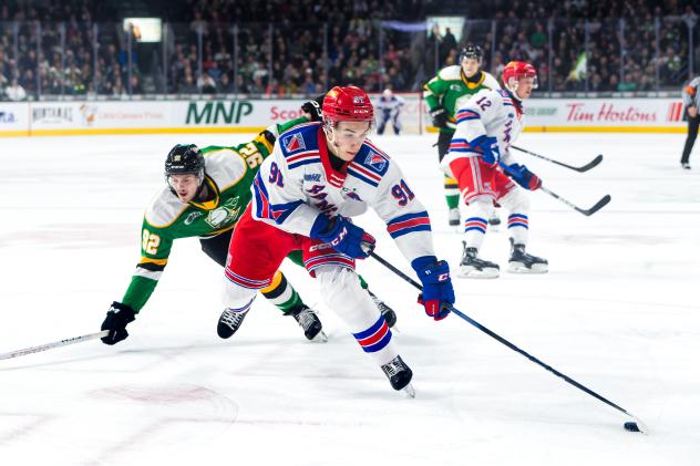 Kitchener Rangers' Matthew Sop and London Knights' Jackson Edward in action