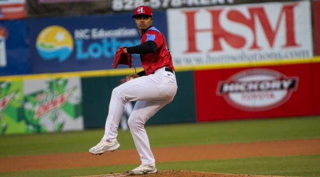 Hickory Crawdads' Winston Santos in action