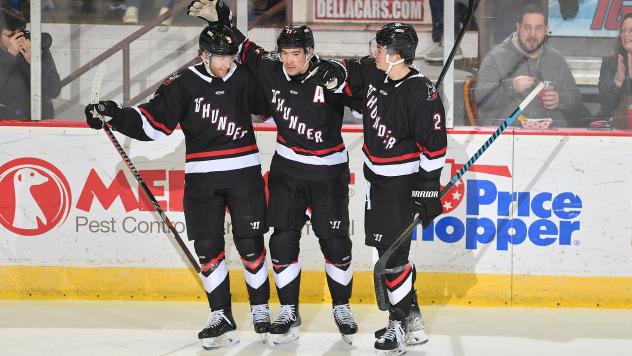 Adirondack Thunder gather following a goal