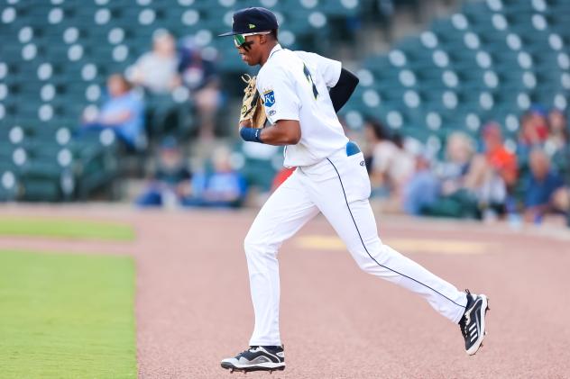 Daniel Vazquez of the Columbai Fireflies runs onto the field