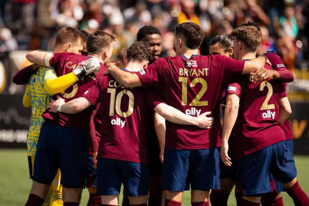 Detroit City FC huddle