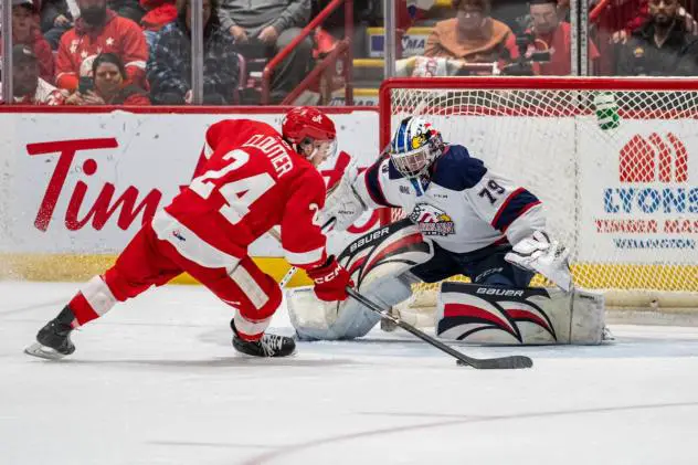 Saginaw Spirit goaltender Nolan Lalonde stuffs the Soo Greyhounds