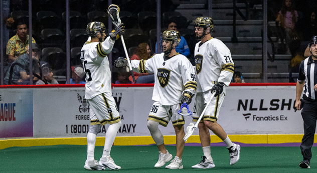 Vancouver Warriors' Keegan Bal, Ryan Martel, and Kevin Crowley on game night