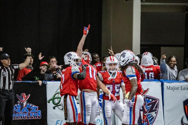 Northern Arizona Wranglers celebrate a score