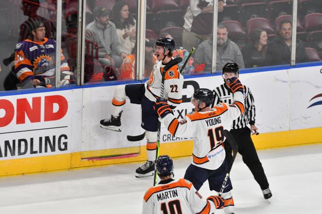 Greenville Swamp Rabbits forwards Quinn Olson and Colton Young and defenseman Max Martin