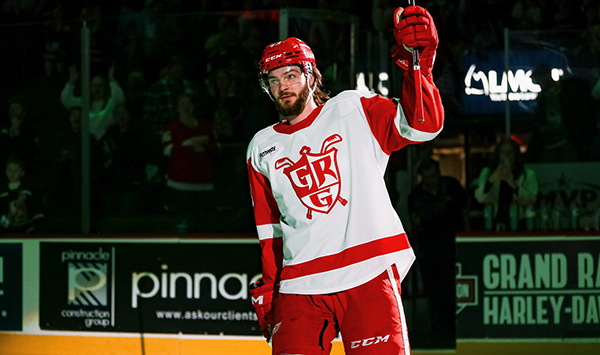 Grand Rapids Griffins salute the crowd