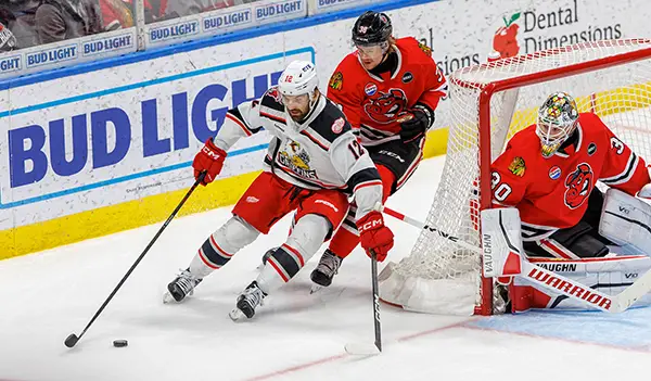 Grand Rapids Griffins left wing Zach Aston-Reese skates around the Rockford IceHogs