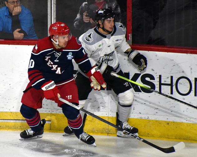 Allen Americans left wing Bennett MacArthur (left) vs. the Idaho Steelheads