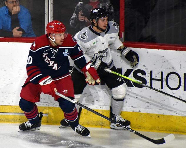 Allen Americans left wing Bennett MacArthur (left) vs. the Idaho Steelheads