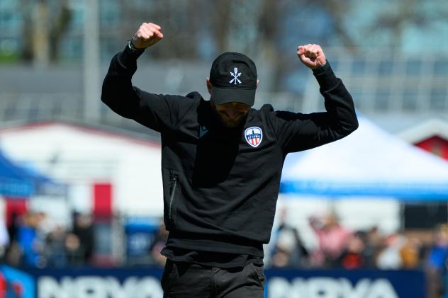 Atlético Ottawa Head Coach Carlos González at full-time celebrating the win against Halifax