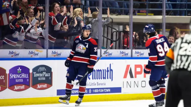 Saginaw Spirit center Hunter Haight reacts after his goal
