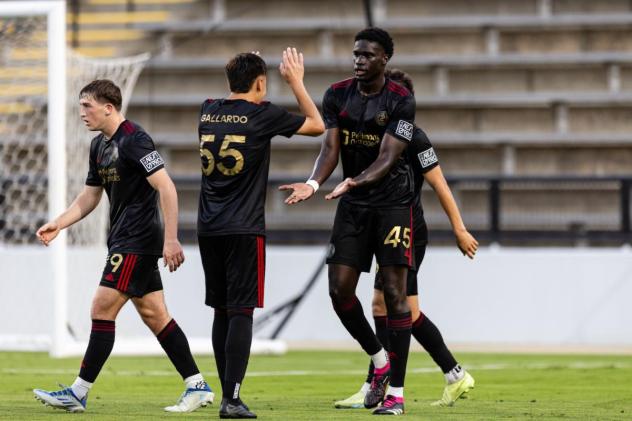 Atlanta United 2's Matías Gallardo congratulates Noble Okello