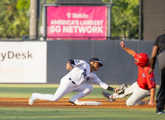 Tampa Tarpons and the Clearwater Threshers in action
