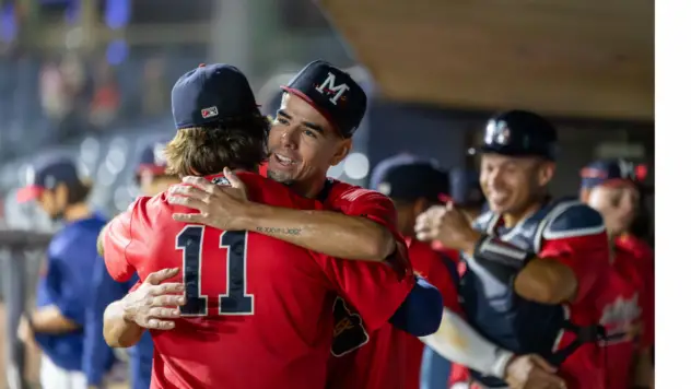 Mississippi Braves' Bryson Horne congratulates Ian Mejia