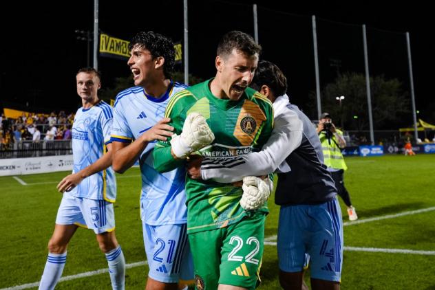 Atlanta United's Stian Gregersen, Efrain Morales, Josh Cohen, and Luis Abram celebrate win