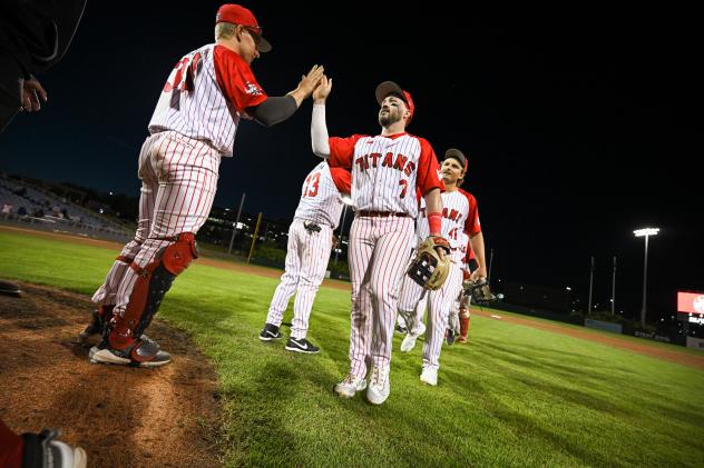 Ottawa Titans exchange high fives following a win