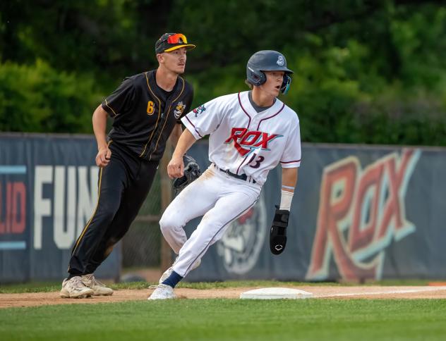 Willmar Stingers' Aidan Byrne and St. Cloud Rox' Luke Doty on game night