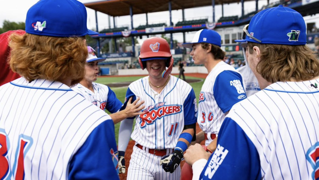 Sam Miller of the Green Bay Rockers is congratulated by teammates