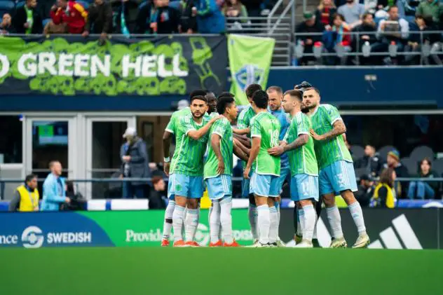 Sounders FC huddle