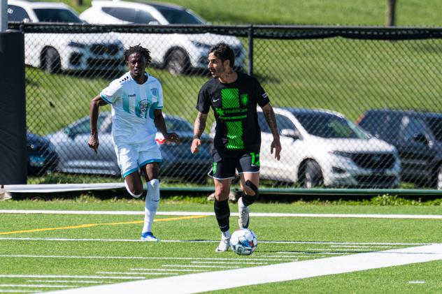 Lexington SC defender Jorge Corrales with possession against Velocity FC